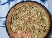 Una foto di crostata ricotta e cioccolato