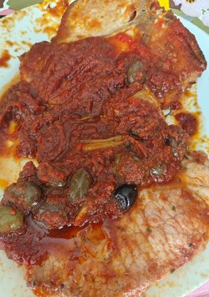 Foto di Braciola di maiale al pomodoro