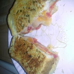 A picture of 4 cheese grilled cheese.