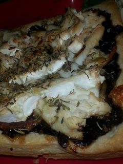 A picture of Weezy's Caramelised onion and goats cheese tart!.