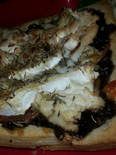 A picture of Weezy's Caramelised onion and goats cheese tart!.