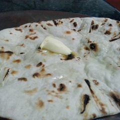 A picture of Butter Naan (Indian Bread).