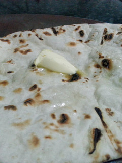 A picture of Butter Naan (Indian Bread).