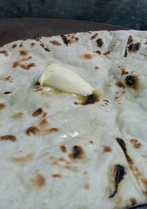 A picture of Butter Naan (Indian Bread).