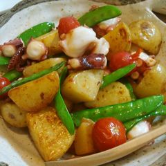 A picture of Sautéed Potatoes and Octoupus.