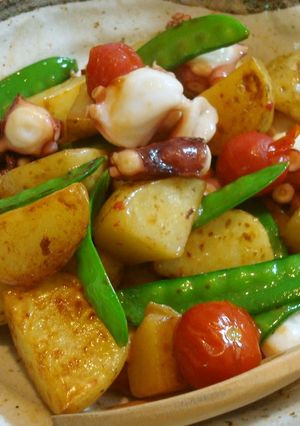 A picture of Sautéed Potatoes and Octoupus.