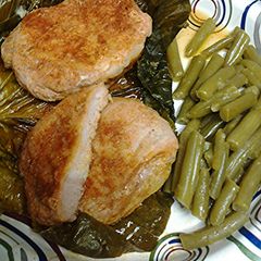 A picture of Pork loin in cabbage leaf.