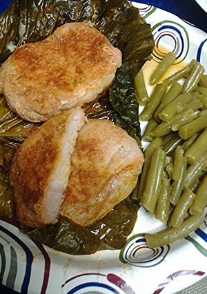 A picture of Pork loin in cabbage leaf.
