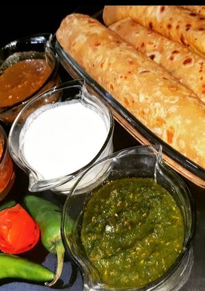 A picture of DAAL PARATHAA WITH DIFFRENT SAUCES ♥️.