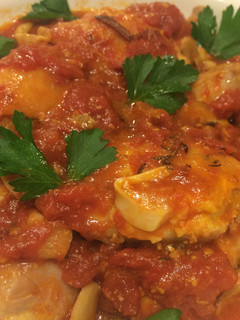 A picture of Chicken In Garlic Tomato Sauce.