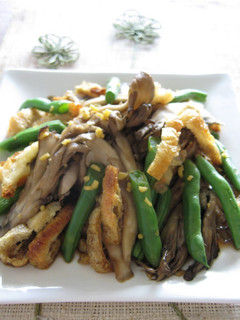 A picture of Maitake Mushrooms and Green Beans with a Ginger and Vinegar Dressing.