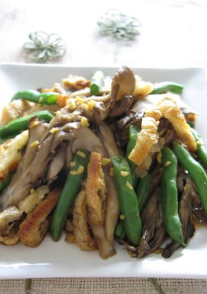 A picture of Maitake Mushrooms and Green Beans with a Ginger and Vinegar Dressing.