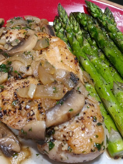 A picture of Pan Seared Chicken with Mushroom & Herb Sauce.