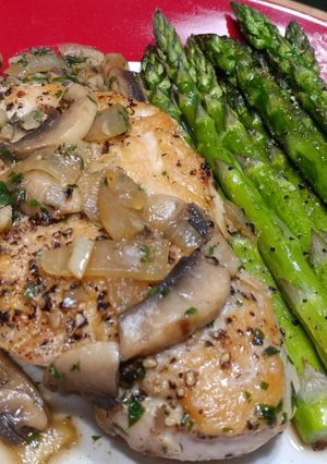 A picture of Pan Seared Chicken with Mushroom & Herb Sauce.