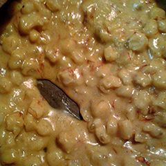 A picture of Hominy and farmer cheese.