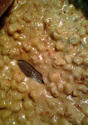 A picture of Hominy and farmer cheese.