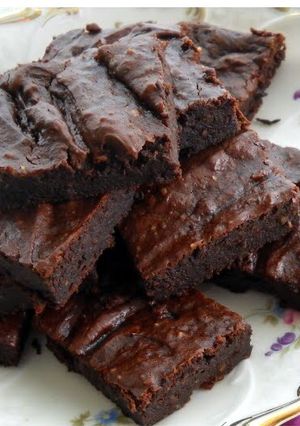 A picture of AVOCADO BROWNIES WITH ORANGE, RUM AND HAZELNUTS.