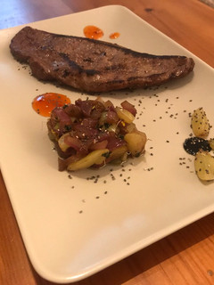 Una foto de Hígado encebollado con uvas
