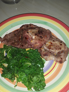 A picture of Lamb and kale.