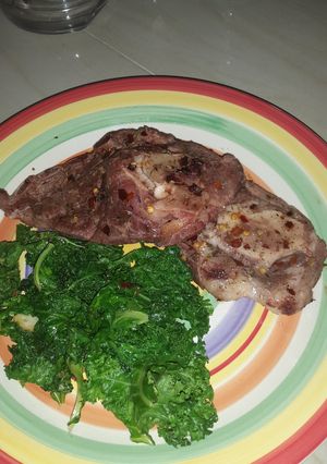 A picture of Lamb and kale.