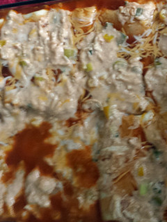 A picture of Chicken enchiladas.