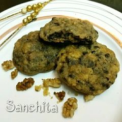 A picture of Chocolate chip butter scotch almonds walnut cookies.