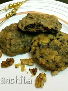 A picture of Chocolate chip butter scotch almonds walnut cookies.