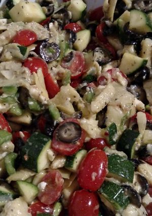 A picture of Artichoke and tomato basil salad.
