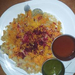 A picture of Oats podi dosa with mixed veggies.