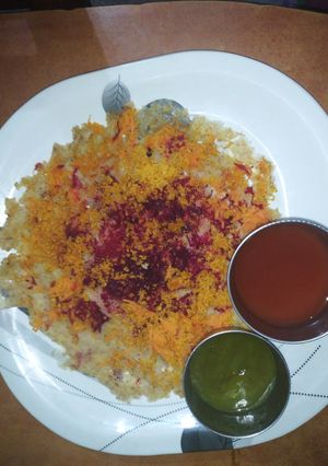 A picture of Oats podi dosa with mixed veggies.