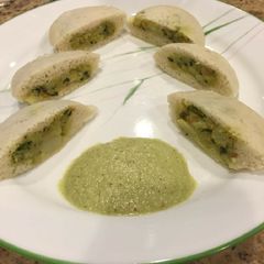 A picture of Idly sandwich or stuffed masala idli.