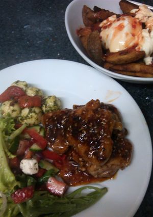 A picture of Jamie Oliver inspired sticky chicken.
