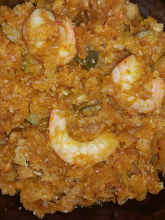 A picture of Shrimp and veggie stew.
