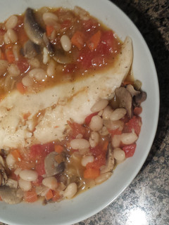 A picture of Tilapia and white beans.