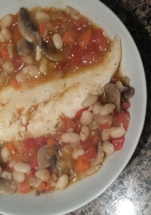 A picture of Tilapia and white beans.