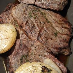 A picture of Grilled Steaks with Compound Spread.