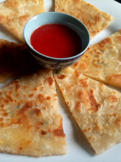 A picture of 3 spice aloo paratha.