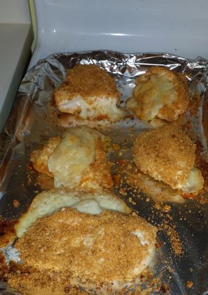 A picture of Shake n bake chicken and swiss.