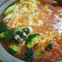 A picture of Easy Tomato Hot Pot with Lots of Melting Cheese.