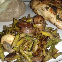 A picture of Sauteed Asparagus with mushrooms and onions.