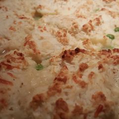 Cheesy biscuit topped chicken pot pie A picture of Cheesy biscuit topped chicken pot pie.