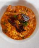 Arroz meloso de butifarras, alcachofas y calçots