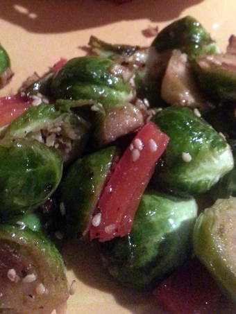 Easy Steps to Make Brussels Sprouts sauteed with garlic and red bell pepper which So Delicious