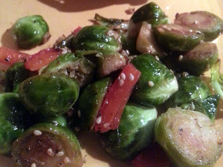 Easy Steps to Make Brussels Sprouts sauteed with garlic and red bell pepper which So Delicious