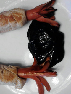 A picture of Squid Dogs W/ Ink ( Halloween ).