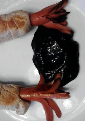 A picture of Squid Dogs W/ Ink ( Halloween ).