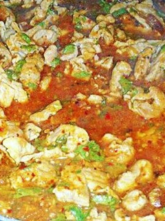 A picture of Carne De Puerco with Chile De Arbol.