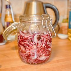 A picture of Pickled Red Onions.