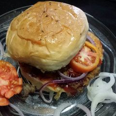 A picture of Chapli kabab burger.
