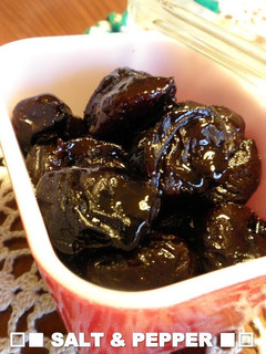 A picture of Dried Prunes Sweetly Simmered In Red Wine.